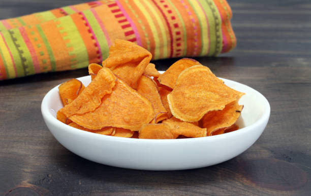istock Sweet Potato Chips in a bowl, macro. 1482761869