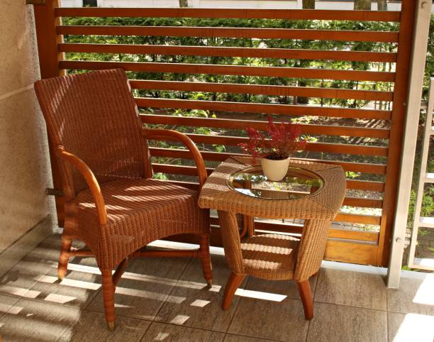istock Wicker chair and small sitting table are on the balcony 1482765115