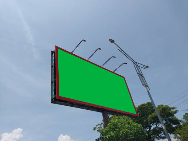 istock Unique and Striking Vertical Chroma Key Billboard with Sky and Clouds Background 1482767101