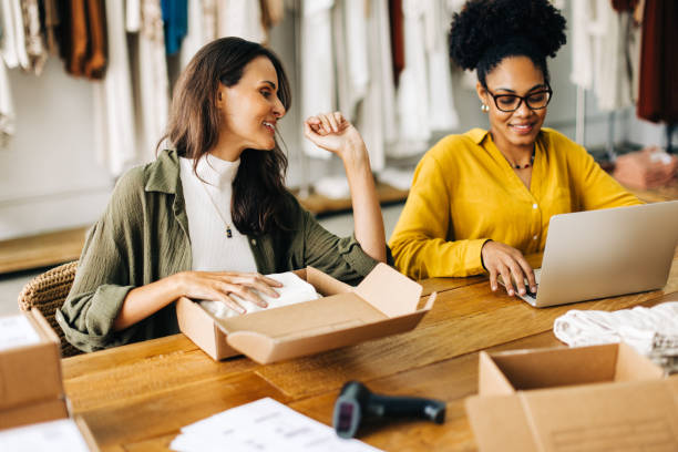 istock Clothing store owners launching an online store for drop shipping 1482770144