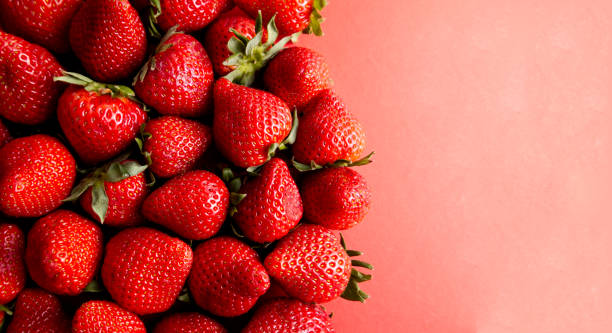 istock Ripe strawberries close-up as a texture background 1482774125