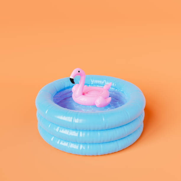 istock Toy flamingo in inflatable pool in studio 1482774332