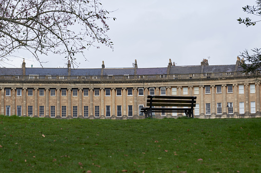 Bath, Somerset, United Kingdom - 21 March 2023: Historic Royal Crescent in the UNESCO World Heritage City of Bath in Somerset, United Kingdom. Georgian Architecture.