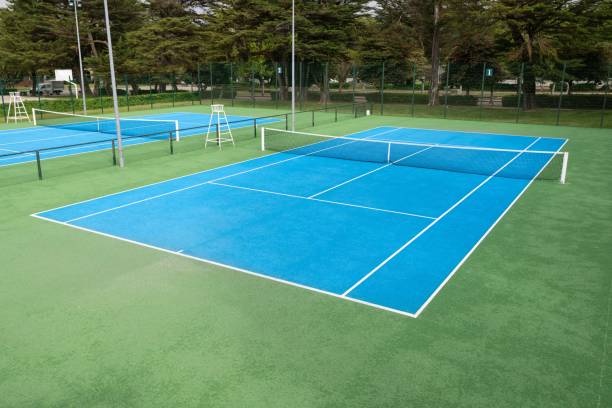 istock Blue Tennis court on a public park 1482776218