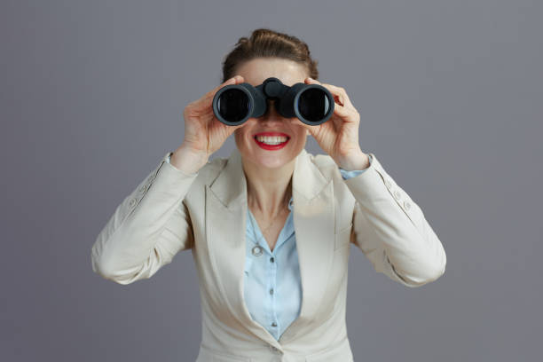 istock happy young woman worker in light business suit 1482778513