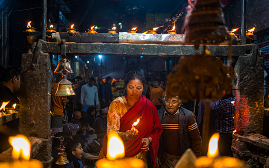 Nepalese devotees worship god during the celebration of Biska vermillion powder  Festival in Thimi, Bhaktapur,  Nepal, on  Friday April 14, 2023