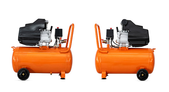 Orange air compressor. An external compressor. industrial compressor in red on a white background.