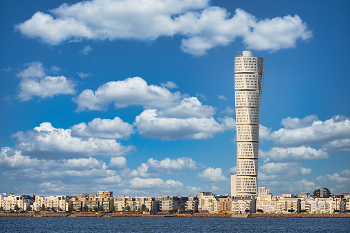 Malmo, Sweden - Aug 15, 2022: Turning Torso skyscraper is the tallest building in Scandinavia with 190 metres (623 ft) and the most recognizable landmark for Malmo.
