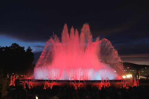 Barcelona, Spain - august 2022: Colors of Magic Fountain of Montjuïc in Barcelona's Plaça d'Espanya, - Spain.