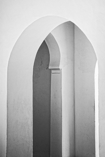 Arched doorway symmetry architecture, Moorish style, black and white abstract architectural simplicity art