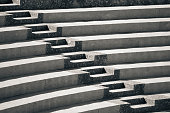 Concrete steps in arena style seating area, Architectural abstract, shadow and light, lines