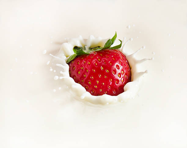 istock Strawberry dropping into a bowl of milk 148278929