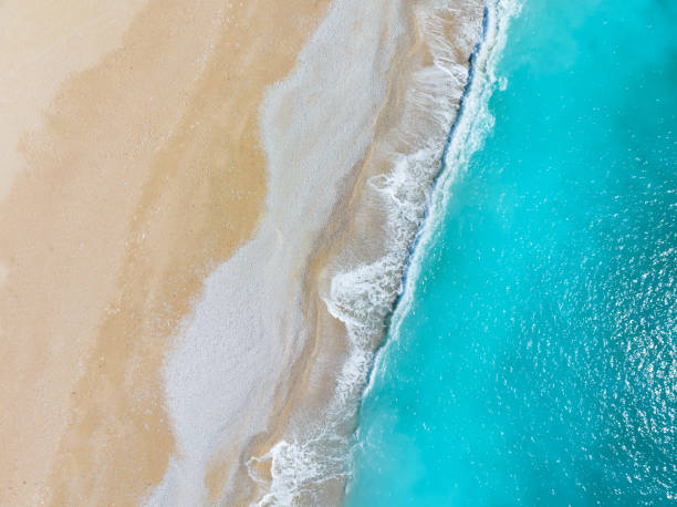 istock Turquoise tropical beach, aerial view drone, clear water and sand texture 1482790804