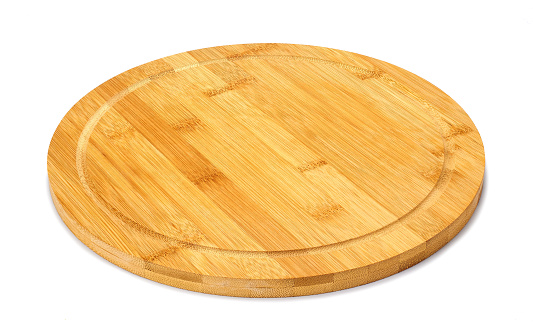 Image of a wooden board for the kitchen of an oval shape on a white background