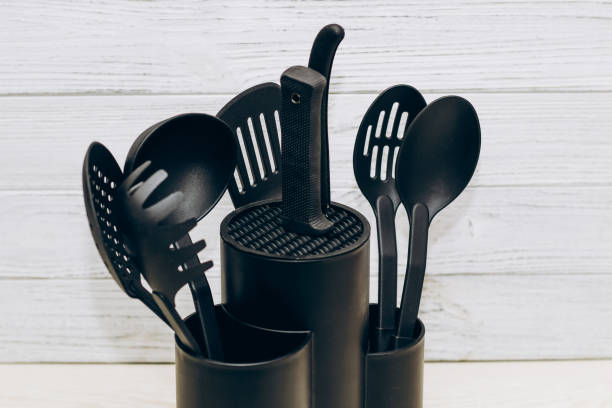 istock Kitchen tools plastic for multicooker on a wooden table in a dish organizer 1482795199