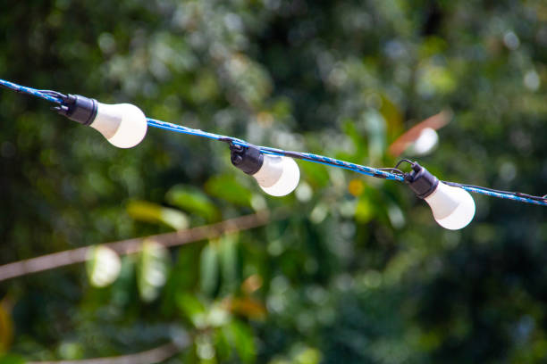 istock Three lamps connected on a wire in Rio de Janeiro, Brazil. 1482798694