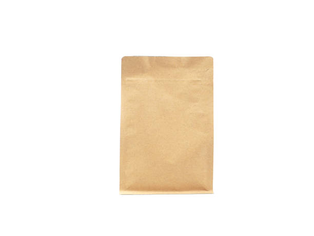 istock Brown craft paper bag packaging with zipper for roasted coffee beans template isolated on a white background. 1482799076