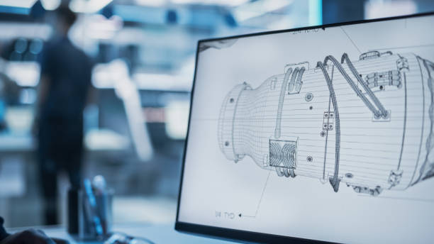 istock Close Up of a Computer Monitor Display with 3D CAD Software with Prototype Turbine Motor Project. Interface with Vital Setting and Programming Options for the Industrial Engine Prototype. 1482799697