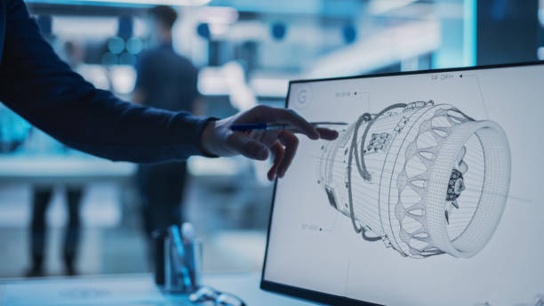 primo piano dello schermo di un monitor di computer desktop con software cad 3d con progetto di prototipo di motore jet. specialista che discute di lavoro, la sua mano visibile davanti allo schermo. - aerospace industry foto e immagini stock