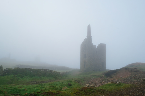 Wheal Owles, an abandoned Cornish tin mine shrouded in mist on the north Cornish coast