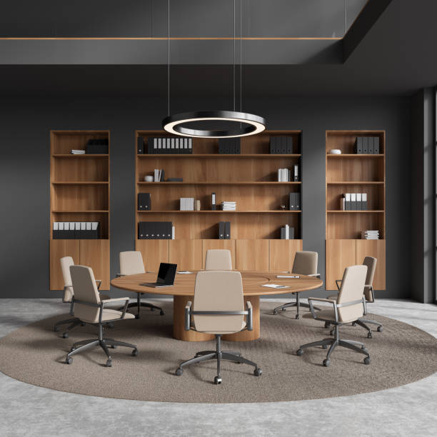 istock Dark business room interior with meeting table and shelf with documents 1482802753