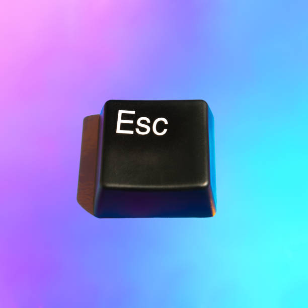 ESC button on a gradient purple and blue  holographic background.