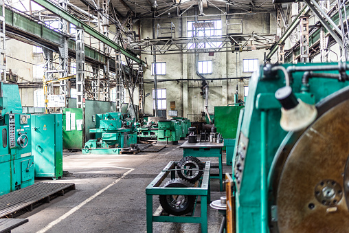 Old equipment, machines, tools in a rustic style in an abandoned mechanical factory