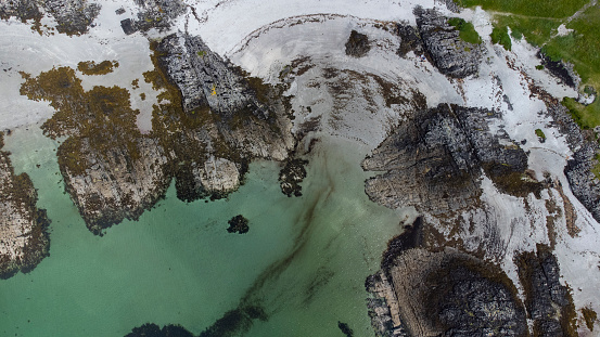 Beautiful green sea at Traigh Beach at Arisaig in Lochaber in the Scottish Highlands