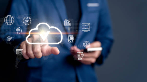 istock businessman taps on a cloud symbol displayed on device connectivity and the implementation of advanced cloud technology systems for optimized data storage resource management, fast-paced digital work. 1482808792