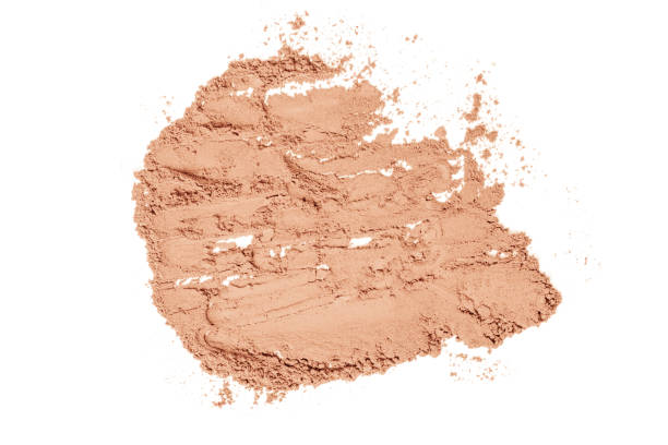 istock Powder and for the face scattered. Powder texture on a white background. 1482810458