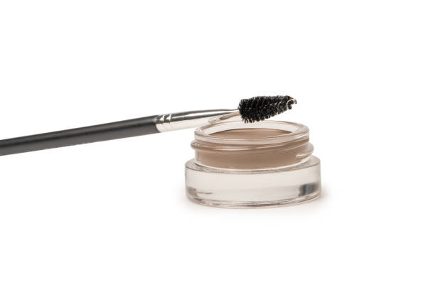 istock A brow pomade in blonde shade with brush isolated on a white background. 1482810557