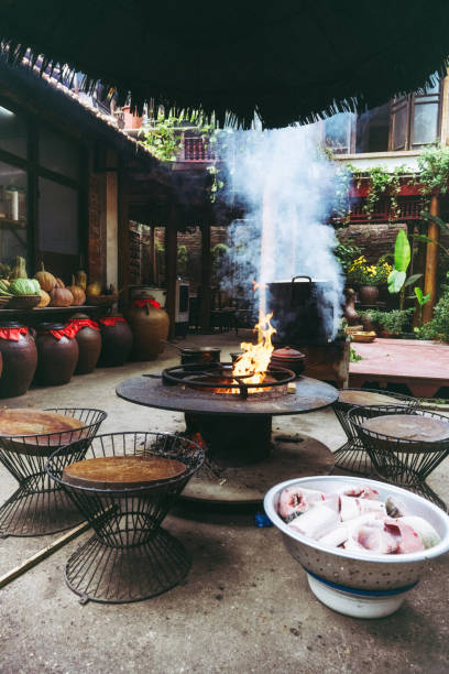 istock cooking on open fire in outdoor kitchen in restaurant 1482814491