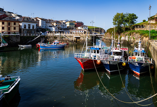 The fishing port Luarca in the bay and moored pleasure yachts. Atlantic coast, Asturias. Romantic trip to Spain