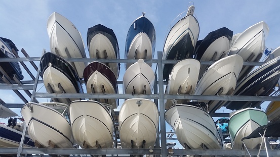 This is a photograph of boats docked in a dry Marina in North Miami, Florida.