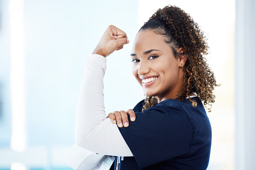 Nurse, portrait or flexing muscle in hospital success, medical trust or empowerment strength on mockup. Smile, happy or doctor in strong bicep for woman healthcare, wellness leadership or motivation