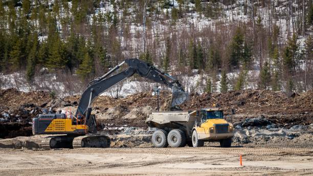 istock Dumper being loaded by an excavator during excavation work 1482828175