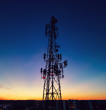 Aerial view of a 4g/5g cellular / radio repeater tower.