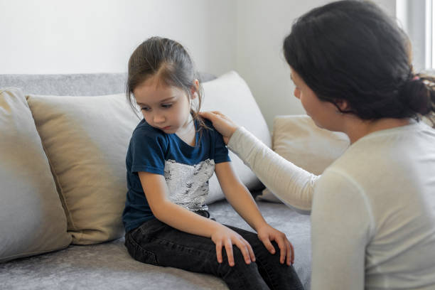 istock Mother is feeling sorry for a crying child 1482829220