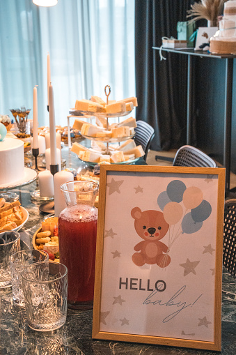 A delightful spread of snacks and treats to share with loved ones, celebrating the joyous occasion of a baby shower.