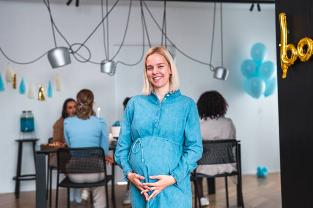 istock Smiling Blonde Mom-to-be with Baby Bump 1482830457