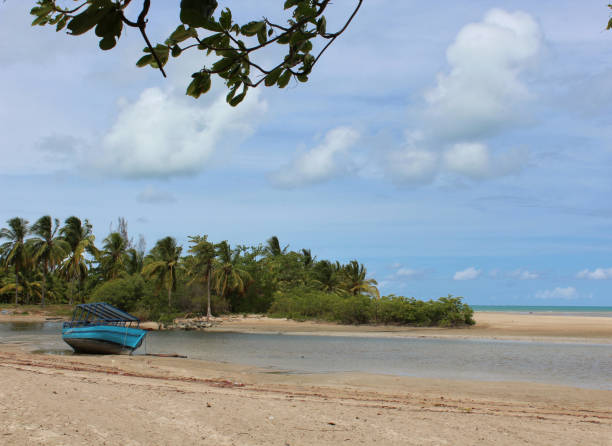 istock A lone boat rests on the sand, with low tide 1482838507