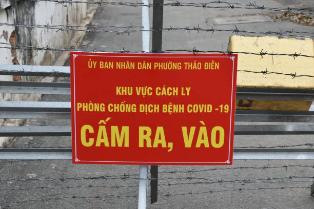 istock Covid-19 Road Block Sign in Vietnamese 1482840728