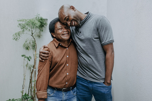 Portrait of a senior father with an adult son