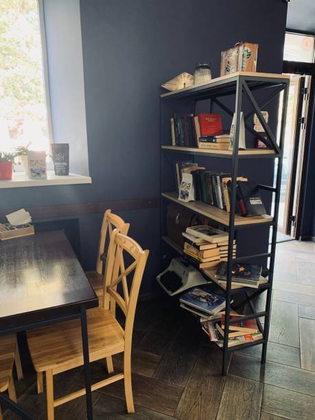 istock Coffee Shop Interior with Bookshelf and Typewriter 1482855282