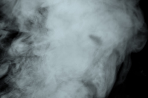 Abstract  powder or smoke isolated on black background,Out of focus
