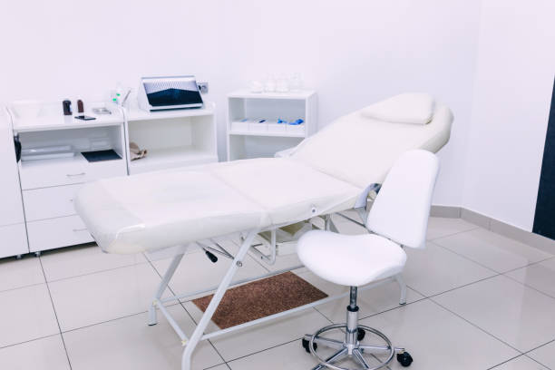 istock Modern medical examination couch in doctor's office 1482857753
