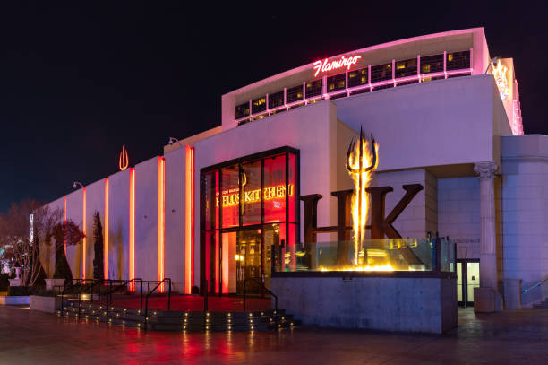 Gordon Ramsay Hell's Kitchen at Night Las Vegas, United States - November 23, 2022: A picture of Gordon Ramsay's Hell's Kitchen at night. neon trident stock pictures, royalty-free photos & images