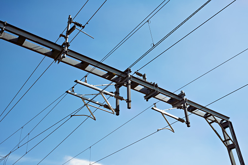 Train and railroad electrical cables, providing power to public transport.