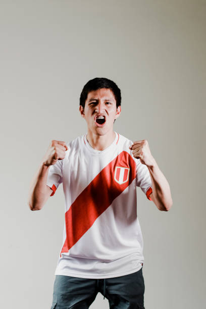 istock Peruvian fan celebrating a goal 1482867325