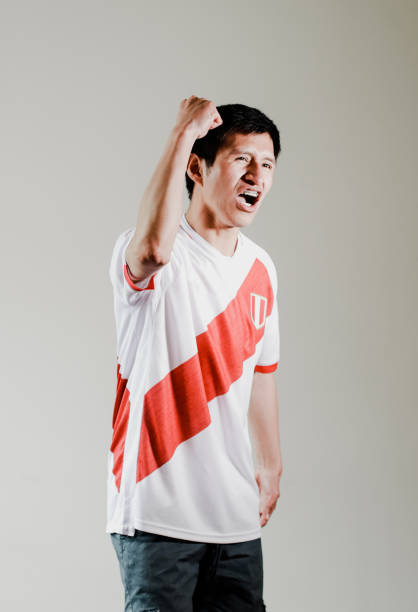 istock Peruvian fan celebrating a goal 1482867356